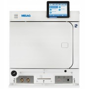 Autoklaw Melag Vacuclav 41B+ Premium z otwartą klapką serwisową pod którą są widoczne gniazda spustowe wody, port drukarki oraz porty przyłączeń dla urządzeń zewnętrznych